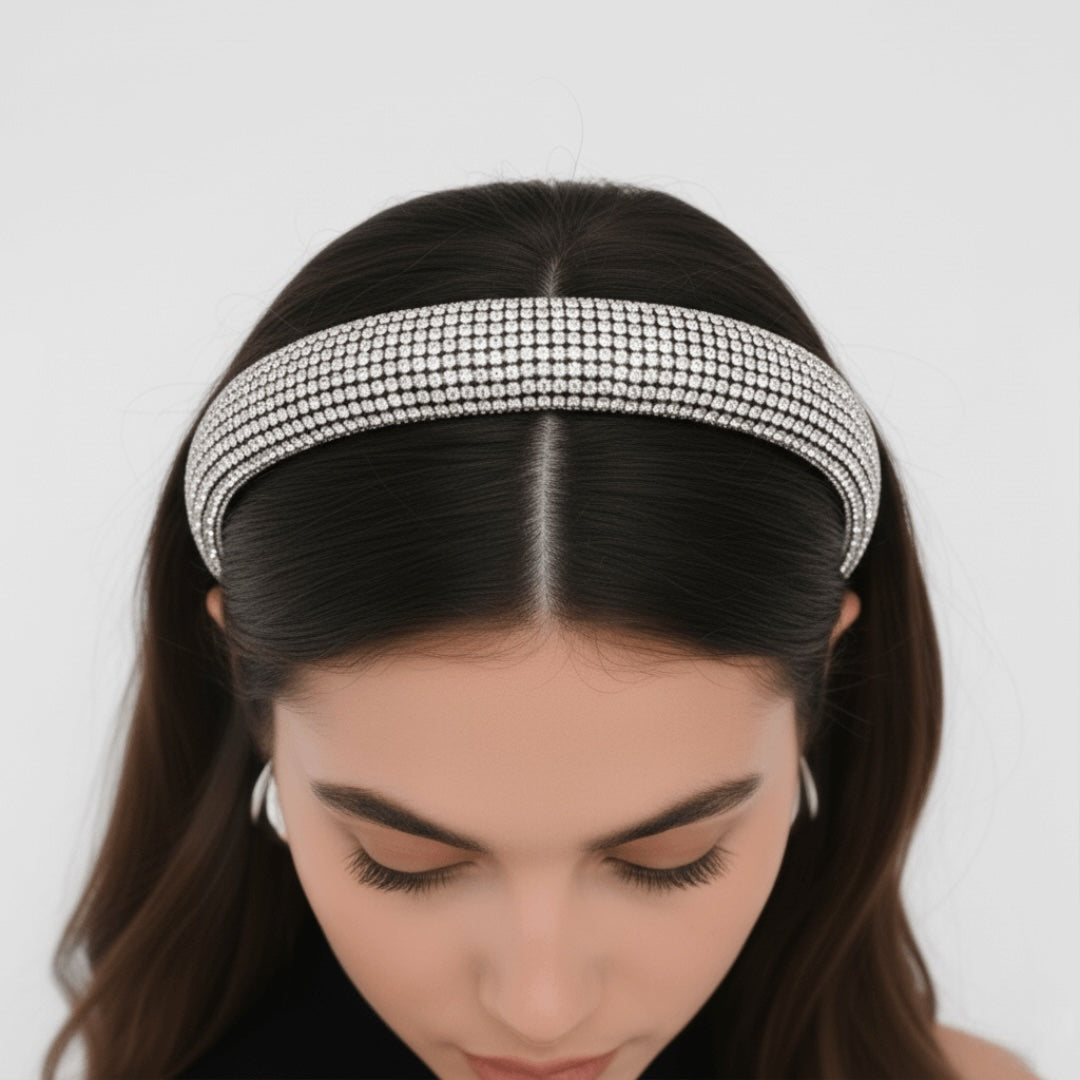 Woman wearing a decorative headband , VINTARAS BAROQUE RHINESTONE HEADBAND , with a plain background
