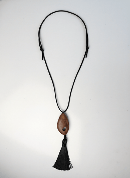 Necklace with a wooden pendant and black tassel -  Vintaras Bette Tassel Necklace- on a white background