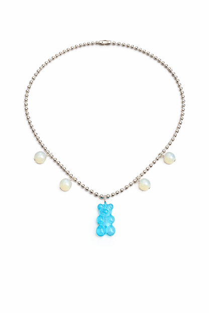 Dolce Bear Necklace with a blue gummy bear pendant on a white background