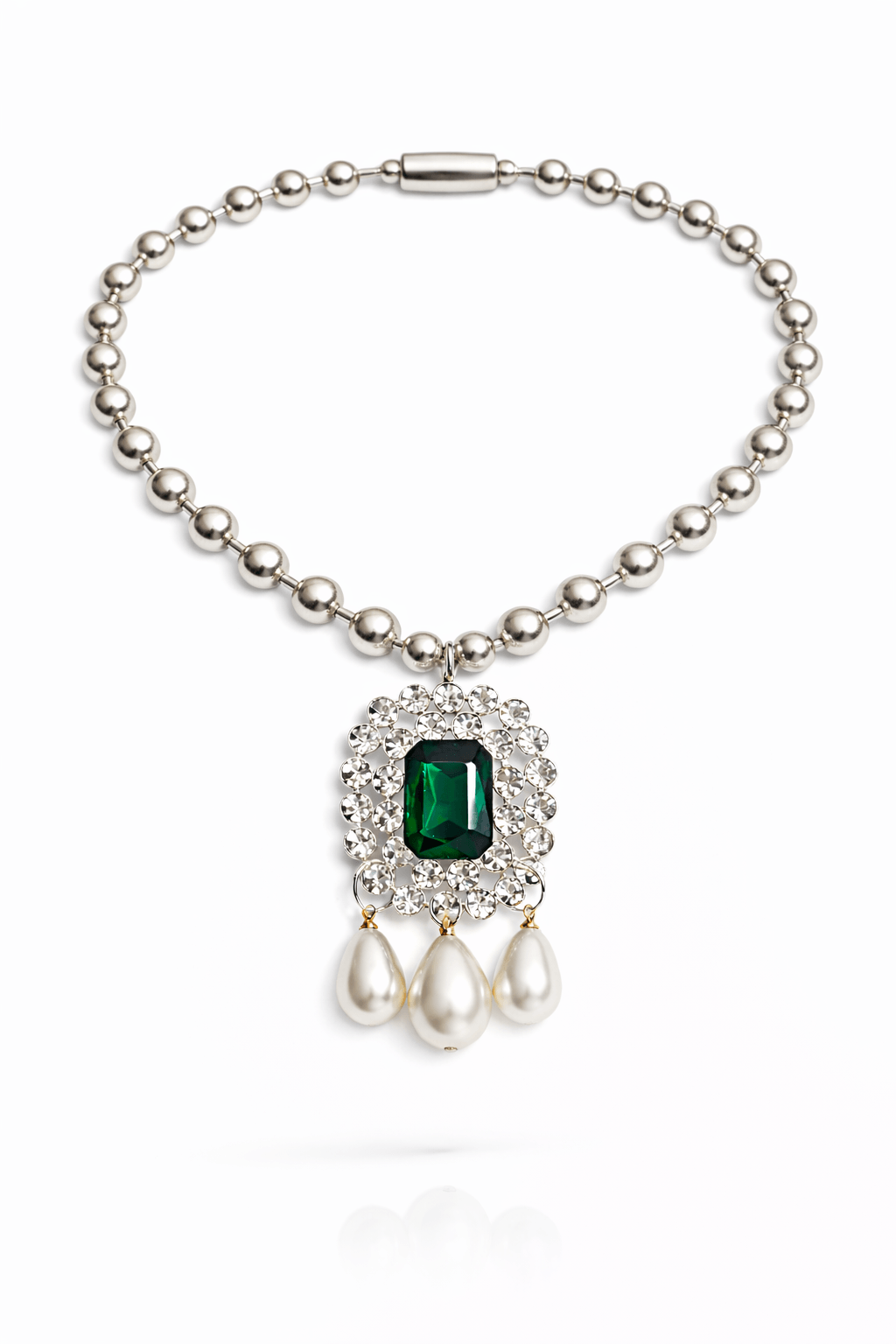 Pearl necklace with a green gemstone pendant on a white background