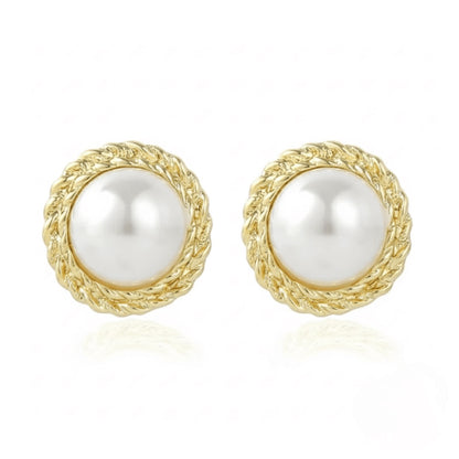 Pair of Vintaras Elise pearl earring with gold frames on a white background