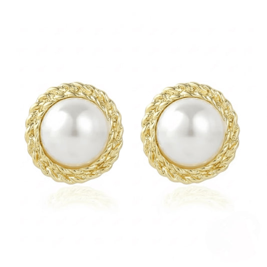 Pair of Vintaras Elise pearl earring with gold frames on a white background