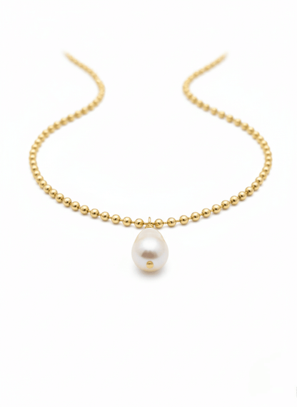 Gold beaded Vintaras Ingrid Necklace with a single tear drop pearl pendant on a white background