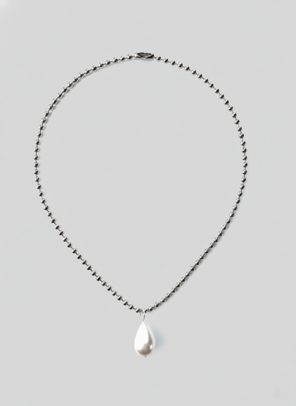 Vintaras Ingrid Necklace Silver with a teardrop-shaped pearl pendant on a light gray background