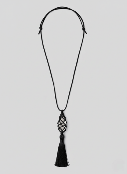 Black tassel necklace , Vintaras Vivien Tassel Necklace , on a light gray background